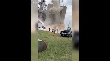 Terrifying video shows workers running away from a collapsing grain bin elevator