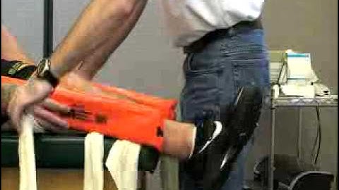 Splint - Rigid Boards to Leg and Knee
