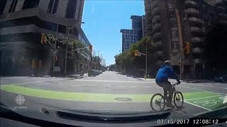 Cyclist survives dramatic collision caught on camera