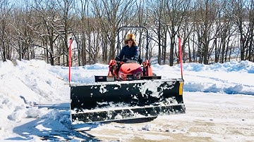 Kubota B2650 Tractor Snow Plowing with a Land Pride STB1072 Snow Tip Blade Implement