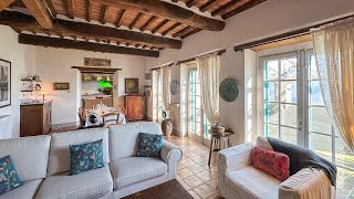 'LE CORTI DI LEONIDA'  Tuscan farmhouses with pool and panoramic view  Antico casale con piscina.
