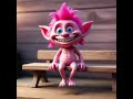A pink troll doll with large eyes and a wide grin