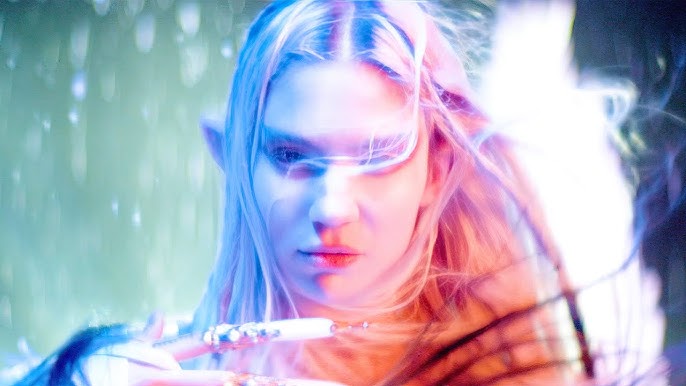 Watch Grimes' lightsaber-wielding video for 'Player Of Games