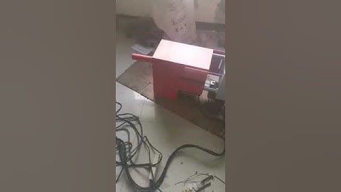 Desktop injection molding machine testing in the factory before delivery