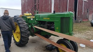Winter John Deere 2 cylinder tractor belt and pull start after repairs.