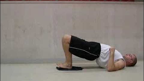 Sliding Leg Curls on the Floor