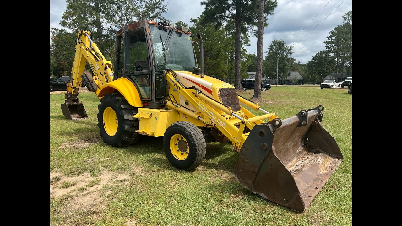 New Holland LB75.B Enclosed Cab 2WD Backhoe Loader (2,149 Hours)