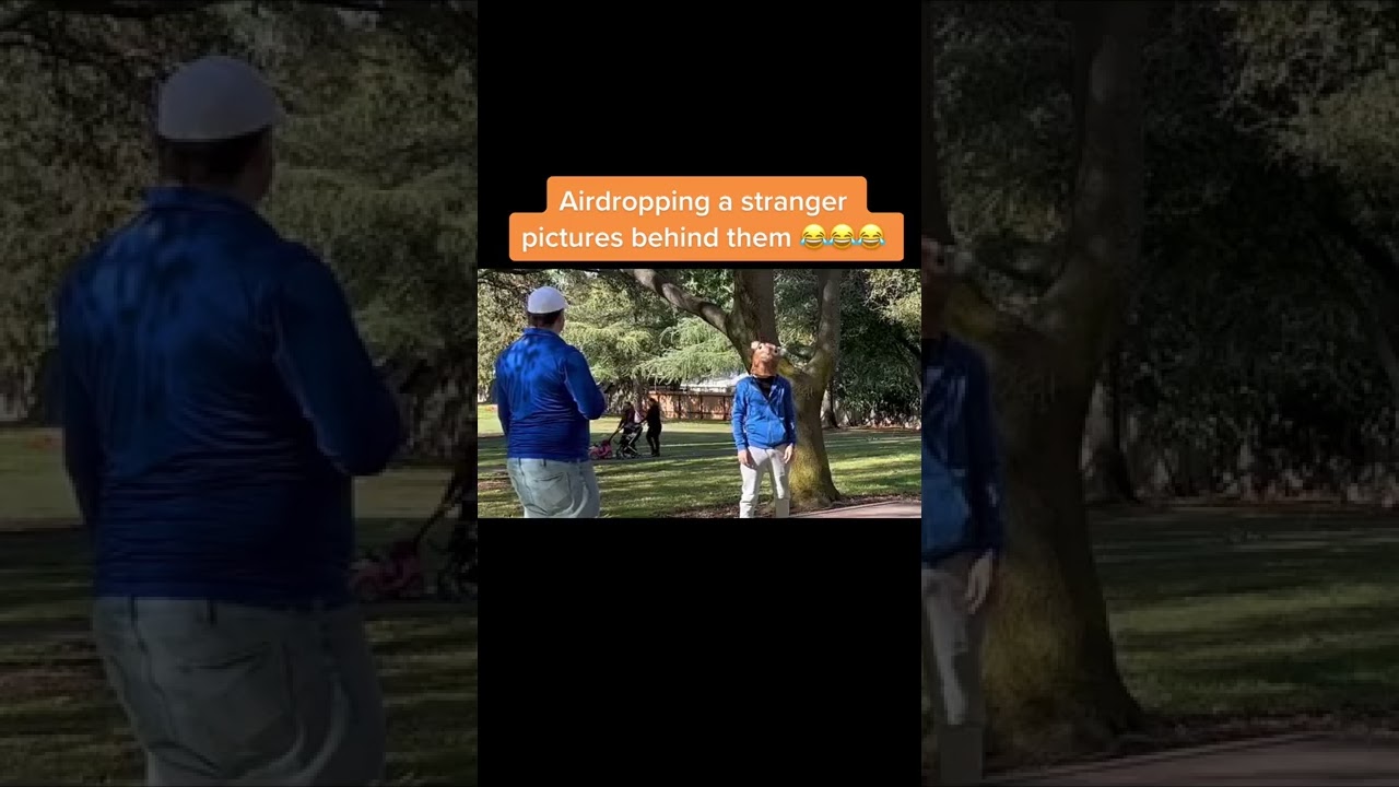 Airdropping a stranger pictures behind them 