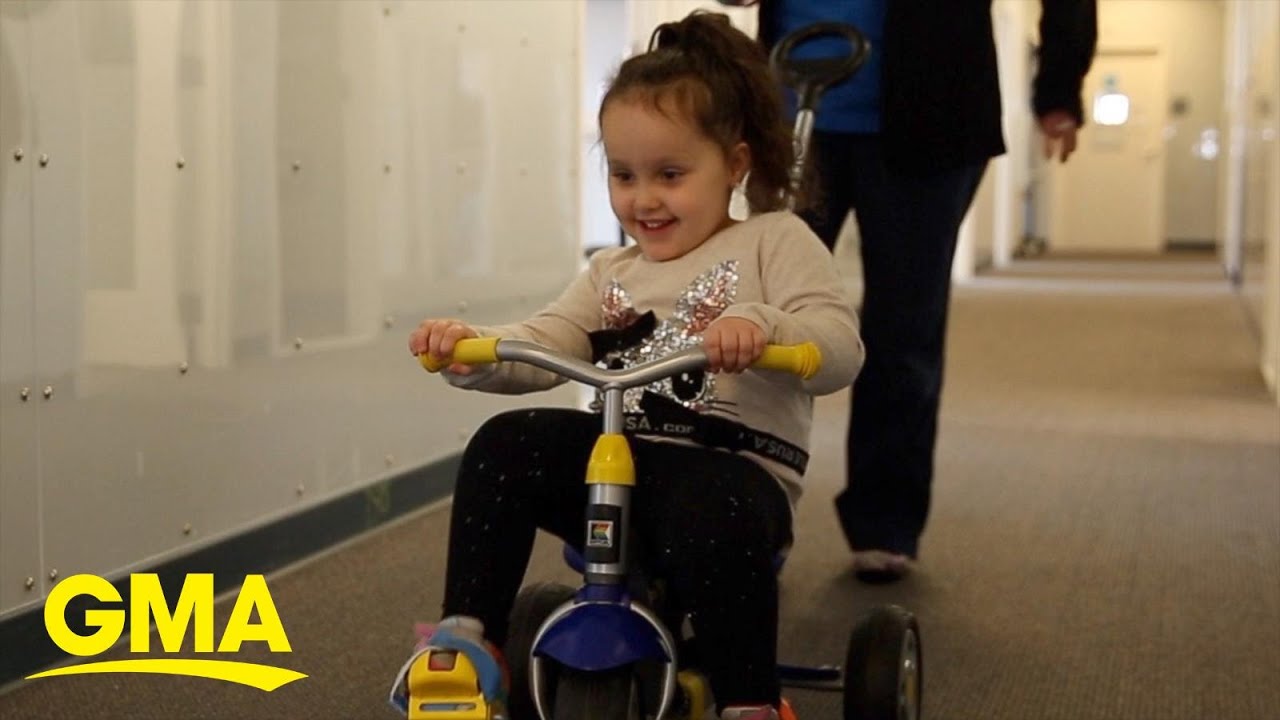 Girl with spina bifida who wasn&rsquo;t expected to walk loves running and kicking goals l GMA Digital