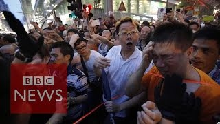 Subscribe to bbc news www./bbcnews there have been scuffles in hong
kong between pro-democracy protesters and local residents pro-beijing
supp...