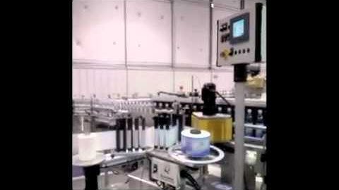 Quadrel | Labeling System | Water Bottle Labeler | High Speed Labeling