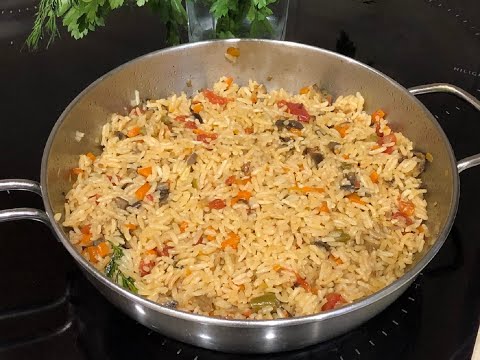 Video: Hoe Kruimelige Pilaf In Een Koekenpan Te Koken?