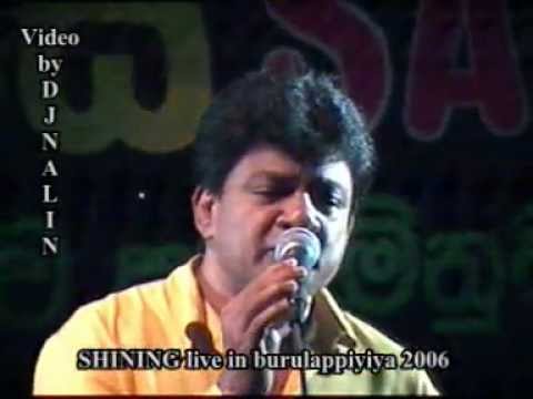 05 Karunarathna Divulgane with Siyinin 2006