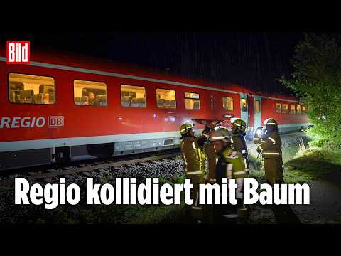 BAYERN: 35 Passagiere sitzen nach Crash mit Baum im Regionalzug fest