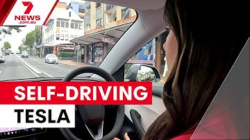 Tesla launches self-driving cars in Australia | 7NEWS