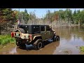 Jeeps attempt water crossing