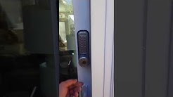 DC Locksmith: Mechanical keypad installed on a sliding glass door