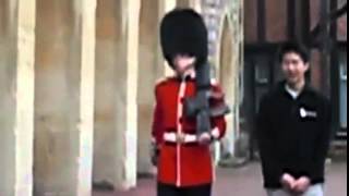 The moment a Queen's Guard soldier lost it and drew his gun at annoying tourist