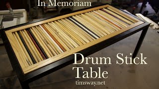 This table was made in memory of a local musician with his used drum sticks. The music is a song I wrote called "Aum" from a 