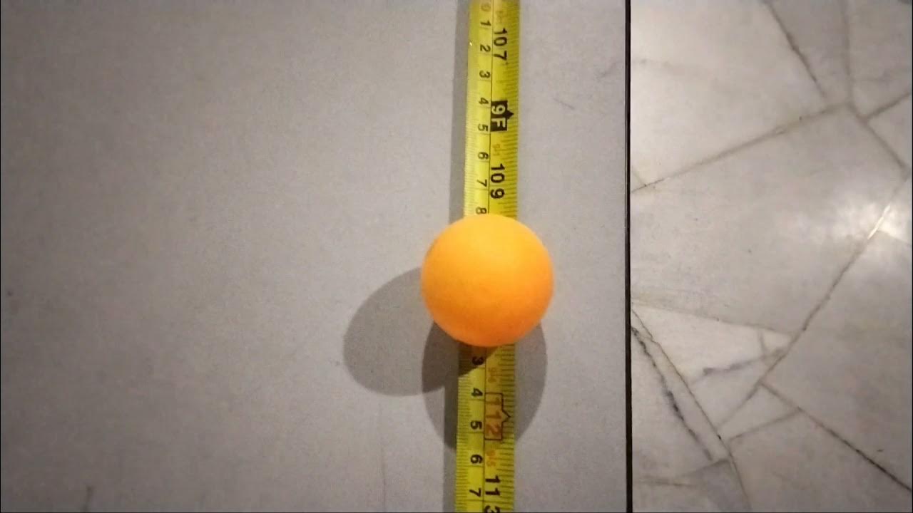 longest ping pong ball roll on measurements tape bounce into a cup of