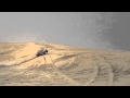 Van merksteijn motorsport testing toyota hilux in qatar jump over dune