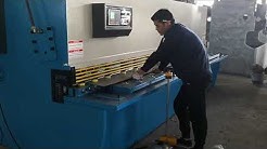 NC hydraulic shearing machine cutting test
