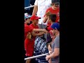 Kid catches a foul ball and his friends go crazy for him! This is awesome