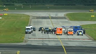 Climate activists block runways at two German airports | AFP