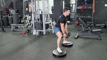 Dual Dumbbell Deficit Sumo Squats