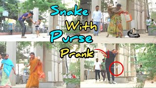 SNAKE WITH PURSE PRANK || MADNESS CENTRED GUYS || TELUGU LATEST PRANK VIDEOS