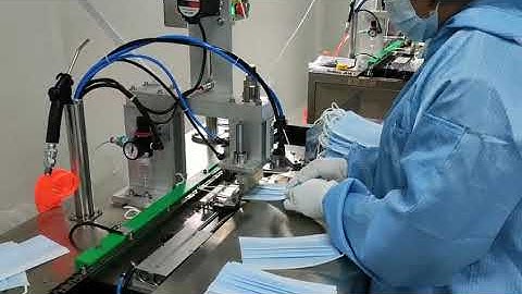 Semi-automatic ear loop welding machine