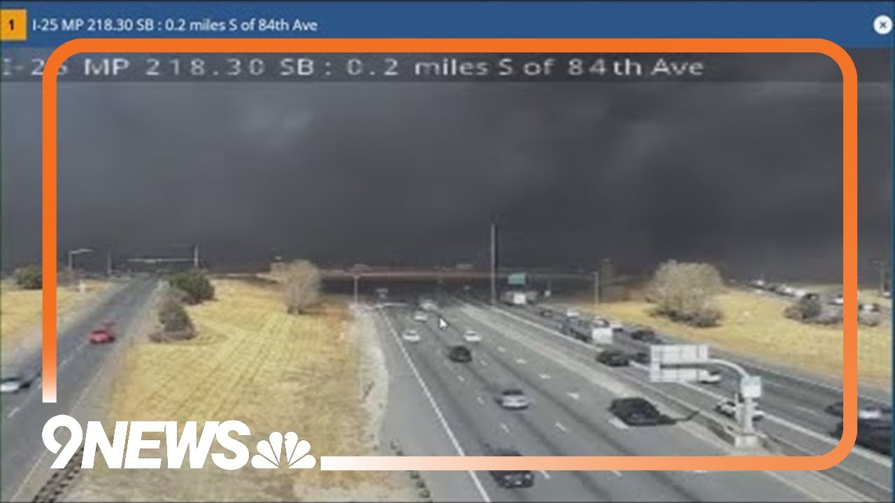 RAW: Smoke from grass fire billows over I-25