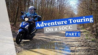 Adventure touring on a 50cc!  Oh my god, it's a baby deer!