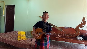 Thumbnail of หนุ่มภูไทน้อย | ดีดลายลมพัดพร้าว