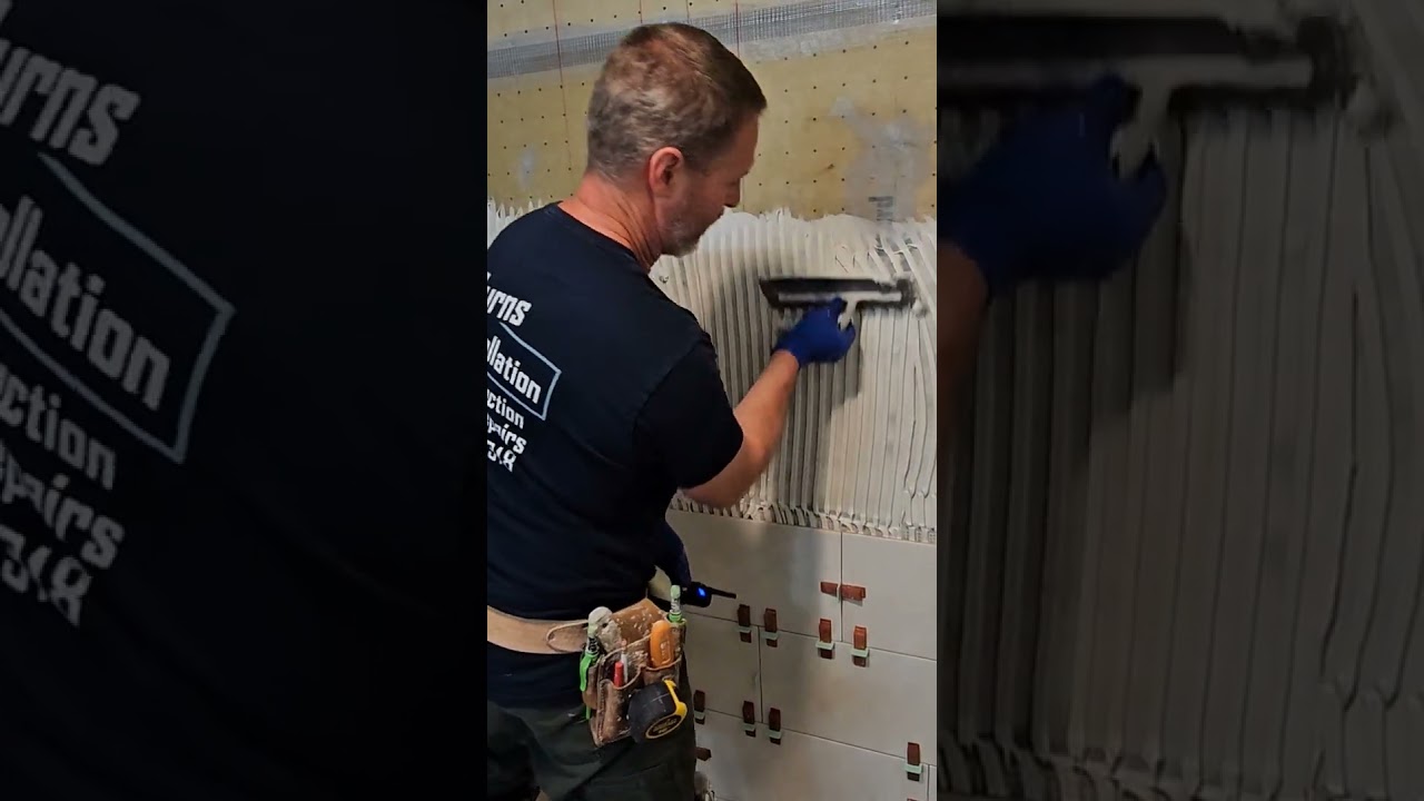 shower build over slab on grade. part 16.2: spreading thinset for the installation of the wall tiles