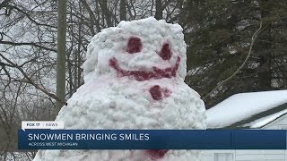 Snowmen popping up all over West Michigan