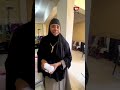 سيدة منياوية تتكفل بكسوة أطفال الأسر الأكثر احتياجًا