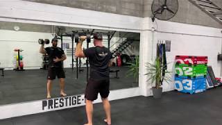 Dumbbell Standing Single Arm Shoulder Press demonstration