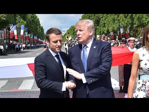 Macron and Trump share a never-ending handshake in Paris - Macron and Trump share a never-ending handshake in Paris
