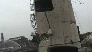 Demolition 300ft. smoke stack Geneva Steel