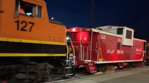 BNSF GP60M 127 & (shoving platform) M930 CE-8 caboose 999718 (formerly ATSF 718) in San Diego, CA