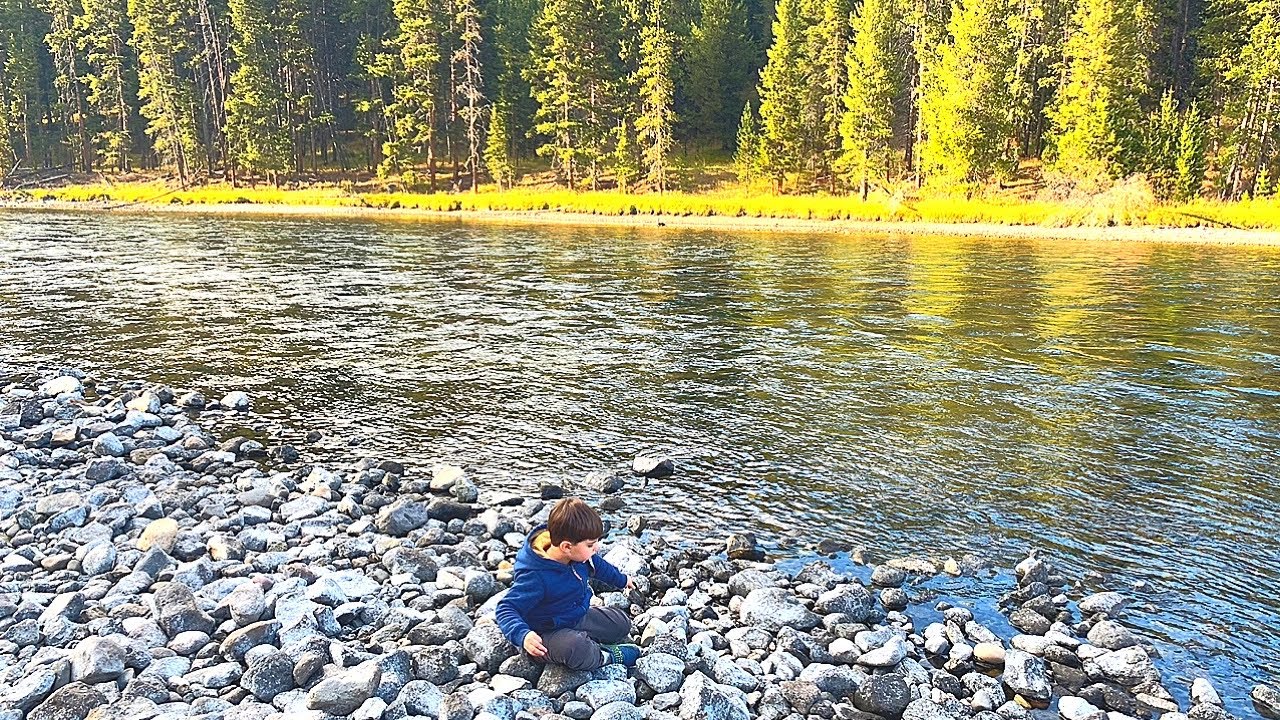 Rami Throwing rocks in water | Yellowstone River | Rock skipping | Fun