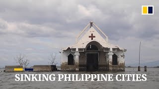 Sinking land swamps Philippine towns, threatens capital Manila