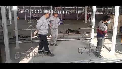 Pass Through hanging chain shot blasting machine is used to auto parts surface cleaning