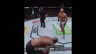 Derrick Lewis fakes injury to land hard right hand on Dos Santos