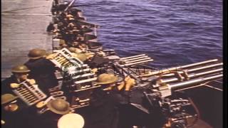 Gun crews aboard carriers of US Task Force fire guns at Japanese aircraft during ...HD Stock Footage