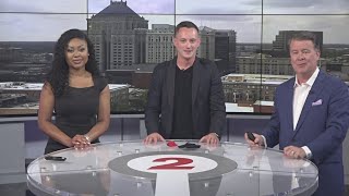 Triad magician performs sleight of hand magic