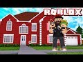 OUR NEW FAMILY HOUSE in ROBLOX ADOPT ME