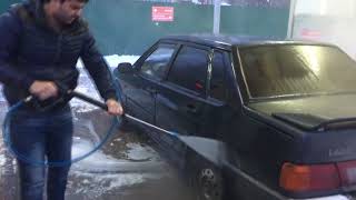 Crazy guy washes his car in heavy frost -16°C degree