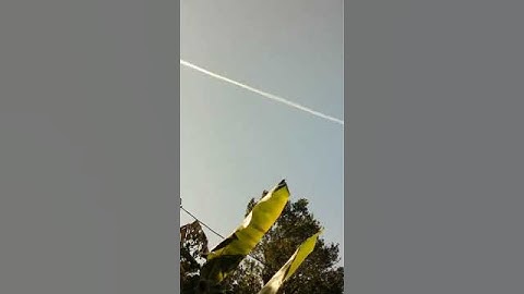 Time-lapsed Action Cam Footage of Clouds and A Passing Contrail #shorts #weather #timelapse